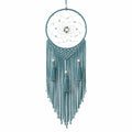 Attrape-rêves mural macramé bleu avec pompons et perles