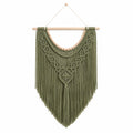 Décoration murale en macramé vert avec perles